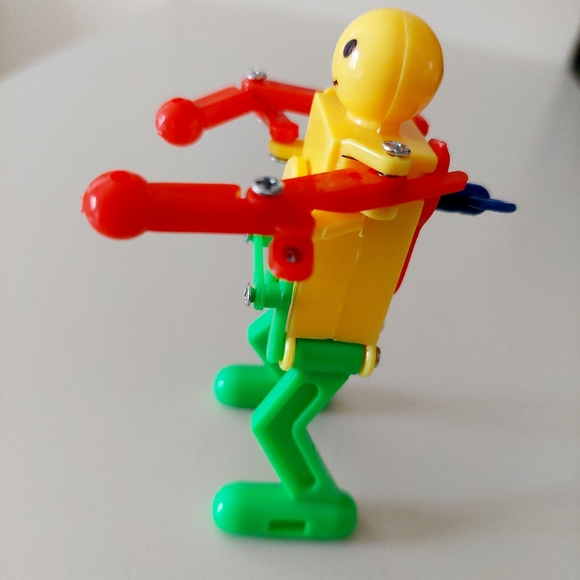 3.5" Fun Wind-up Dancing Walking Robot Toy Red Green and Yellow. Makes a great - Picture 4 of 11